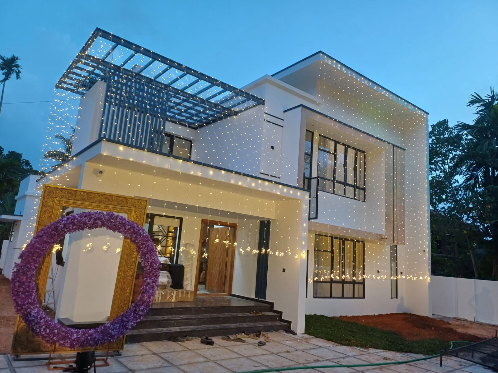 Luxaar Kanyakumari Residence - Modern home with string lights